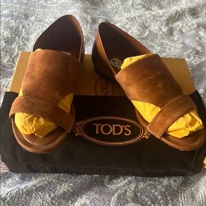 Tod's rust colored suede slip on flats size 7.5